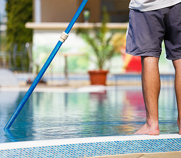 Scottsdale resident cleaning pool